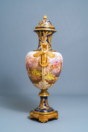 A pair of massive French S&egrave;vres-style vases with gilt bronze mounts, signed Desprez, 19th C.