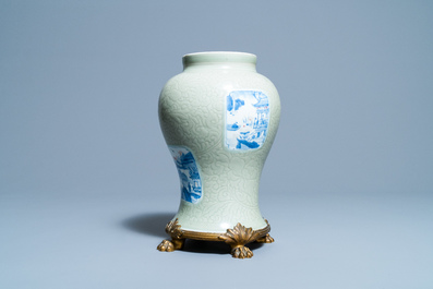 Een Chinese celadon vaas met blauw-witte en koperrode panelen, Kangxi