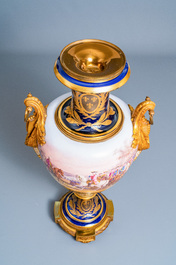 A pair of massive French S&egrave;vres-style vases with gilt bronze mounts, signed Desprez, 19th C.