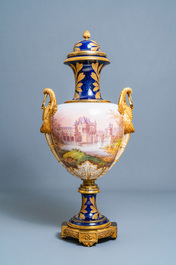 A pair of massive French S&egrave;vres-style vases with gilt bronze mounts, signed Desprez, 19th C.