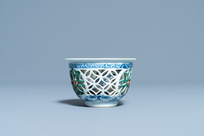 A rare Chinese famille verte reticulated double-walled cup, Kangxi