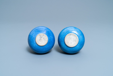A pair of Chinese monochrome powder blue bottle vases, Kangxi