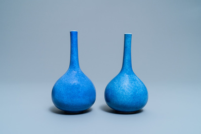 A pair of Chinese monochrome powder blue bottle vases, Kangxi