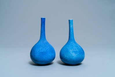 A pair of Chinese monochrome powder blue bottle vases, Kangxi