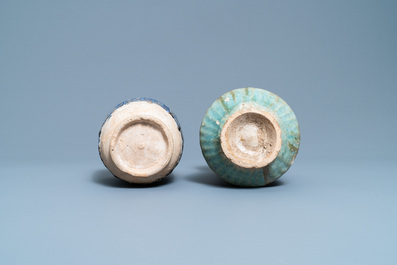 A turquoise-glazed Islamic pottery albarello and a blue-glazed ewer, Iran or Syria, 12/13th C.