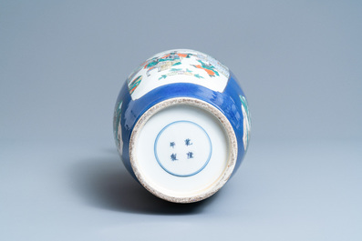 A Chinese famille verte powder blue-ground vase, 19th C.