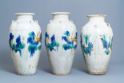 Three large Chinese polychrome relief-molded martaban jars, Qing