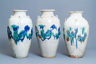 Three large Chinese polychrome relief-molded martaban jars, Qing