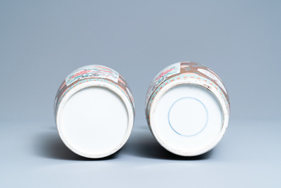 A pair of Chinese famille rose rouleau vases, 19th C.