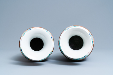 A pair of Chinese famille rose rouleau vases, 19th C.