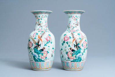 A pair of Chinese famille rose 'phoenix' vases, 19th C.