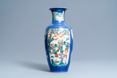 A Chinese famille verte powder blue-ground vase, 19th C.