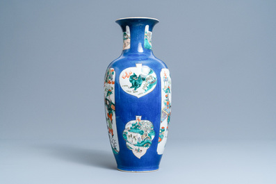 A Chinese famille verte powder blue-ground vase, 19th C.