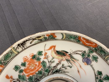 Two Chinese famille verte cup stands, a teapot and a plate, Kangxi