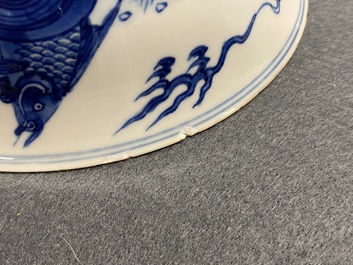 A Chinese blue and white 'dragon and carps' bowl, Xuande mark, Kangxi