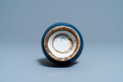 A Chinese monochrome blue garlic head vase with applied biscuit dragon, Jiajing