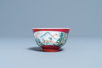 A Chinese famille rose ruby-ground cup and saucer, Yongzheng