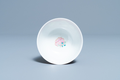 A Chinese famille rose ruby-ground cup and saucer, Yongzheng