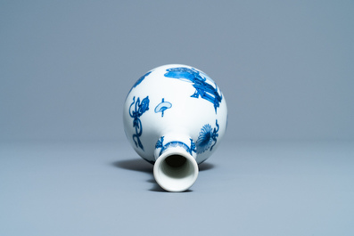 A Chinese blue and white 'antiquities' bottle vase, Kangxi