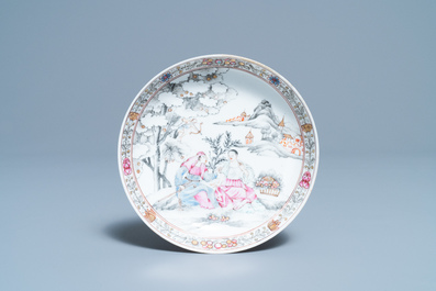 A Chinese famille rose 'romantic subject' cup and saucer, Yongzheng/Qianlong