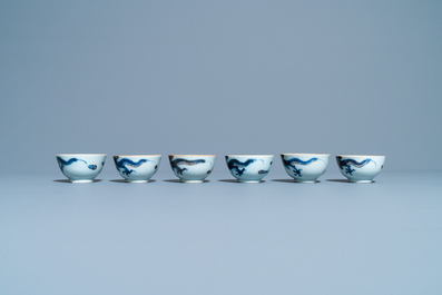 Six Chinese doucai 'dragon' cups and saucers, Kangxi
