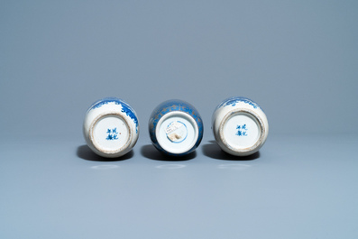 A pair of Chinese blue and white crackle-glazed rouleau vases and a gilt-decorated powder blue vase, 19th C.