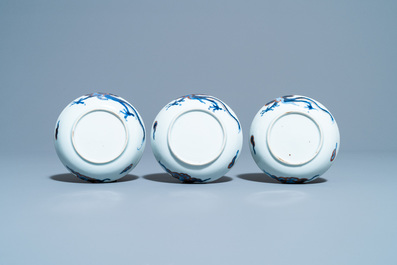 Six Chinese doucai 'dragon' cups and saucers, Kangxi