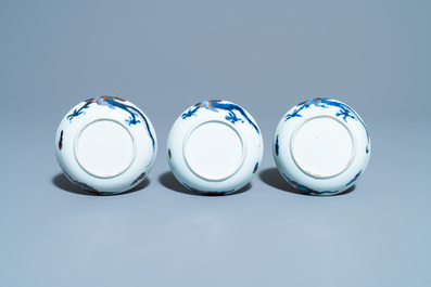 Six Chinese doucai 'dragon' cups and saucers, Kangxi