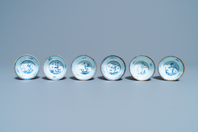 Six Chinese blue, white and copper red cups and saucers, Kangxi