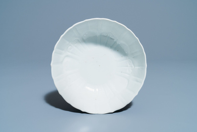 A Chinese blue and white lotus-molded bowl, Jiajing mark, 19th C.
