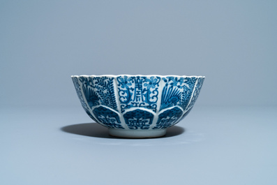 A Chinese blue and white lotus-molded bowl, Jiajing mark, 19th C.