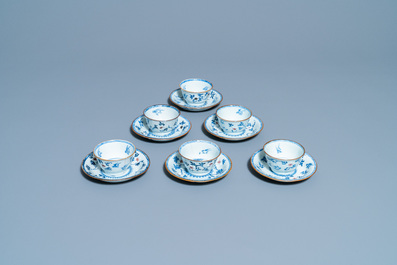Six Chinese blue, white and copper red cups and saucers, Kangxi