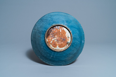 A Chinese monochrome blue Swatow dish with incised carp design, Ming