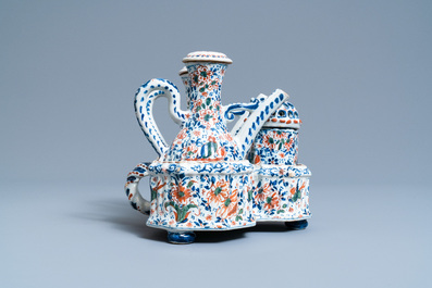 A Dutch Delft cashmere palette cruet set and shaker on stand, 1st quarter 18th C.