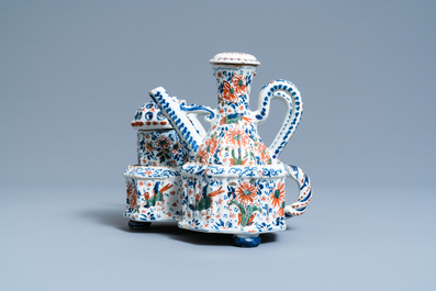 A Dutch Delft cashmere palette cruet set and shaker on stand, 1st quarter 18th C.