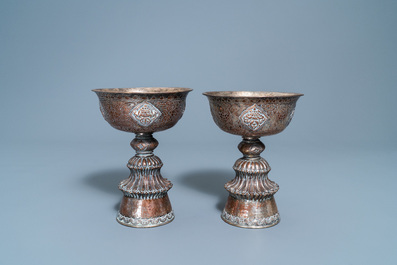 A pair of Tibetan silvered copper alloy altar bowls, 19/20th C.