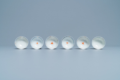 Four Chinese Imari-style plates, a large teapot and six cups and saucers, Kangxi/Qianlong