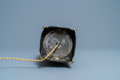 A Chinese blue, white and copper red gilt bronze lamp-mounted vase, 19th C.