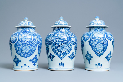 Three Chinese blue and white Islamic market vases and covers, Kangxi