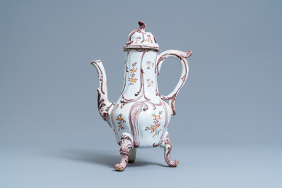 A tall polychrome Dutch Delft coffee pot and cover, 18th C.