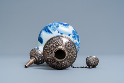 A Chinese silver-mounted blue and white kendi, Kangxi