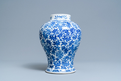 A Chinese blue and white 'lotus scroll' vase, 19th C.