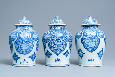 Three Chinese blue and white Islamic market vases and covers, Kangxi