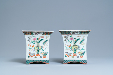 A pair of Chinese rectangular famille rose jardini&egrave;res, 19th C.