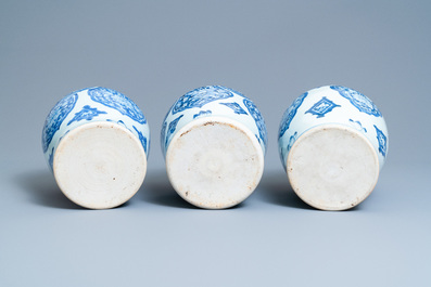Three Chinese blue and white Islamic market vases and covers, Kangxi