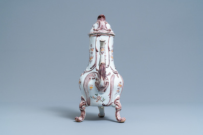 A tall polychrome Dutch Delft coffee pot and cover, 18th C.