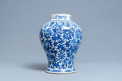 A Chinese blue and white 'lotus scroll' vase, 19th C.