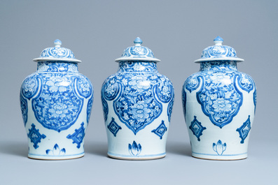 Three Chinese blue and white Islamic market vases and covers, Kangxi