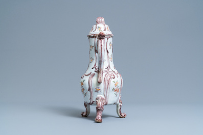 A tall polychrome Dutch Delft coffee pot and cover, 18th C.