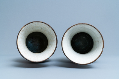 A pair of Chinese famille rose relief-molded vases and two with phoenixes, 19th C.